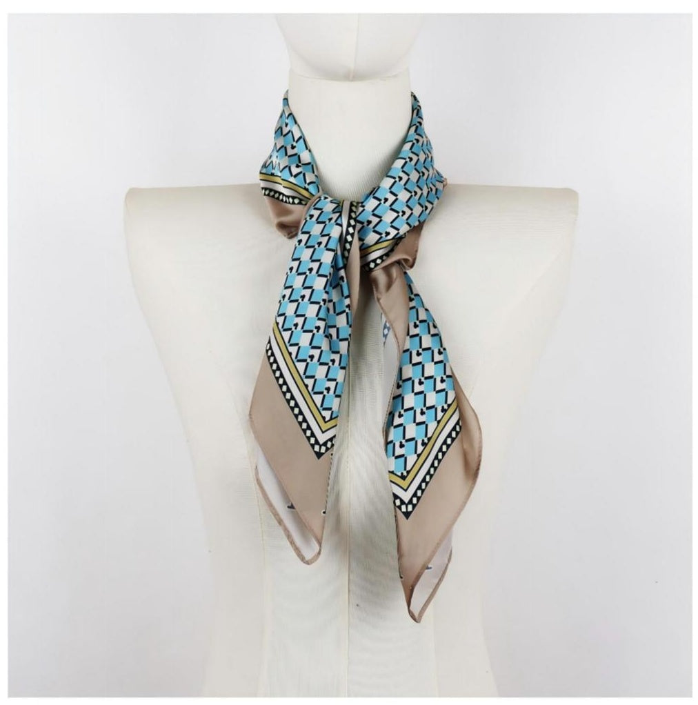 Square geometric print scarf on mannequin, cyan grid pattern, satin hand feel