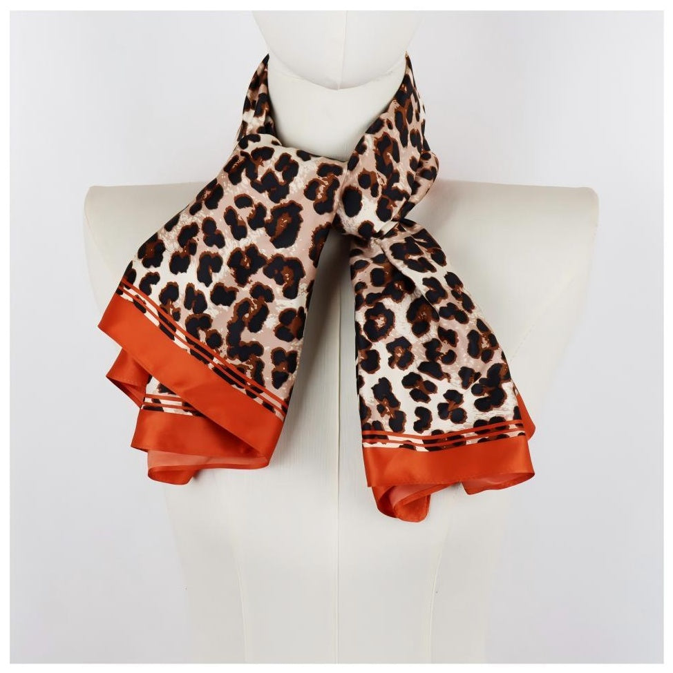 Square leopard print scarf on mannequin, satin hand feel, front overview