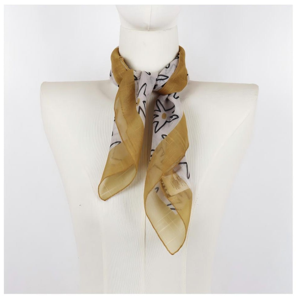 Square floral scarf on mannequin, mustard border, lightweight drape