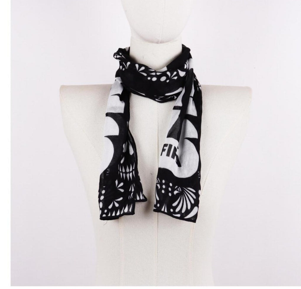 Black and white graphic print decorative long scarf on mannequin