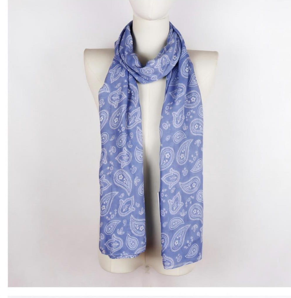 Light blue paisley long scarf draped on mannequin
